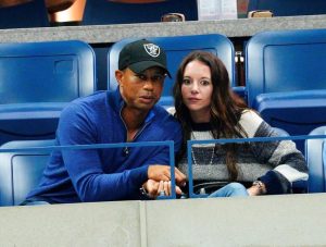 tiger-woods-erica-herman-cheer-100457695