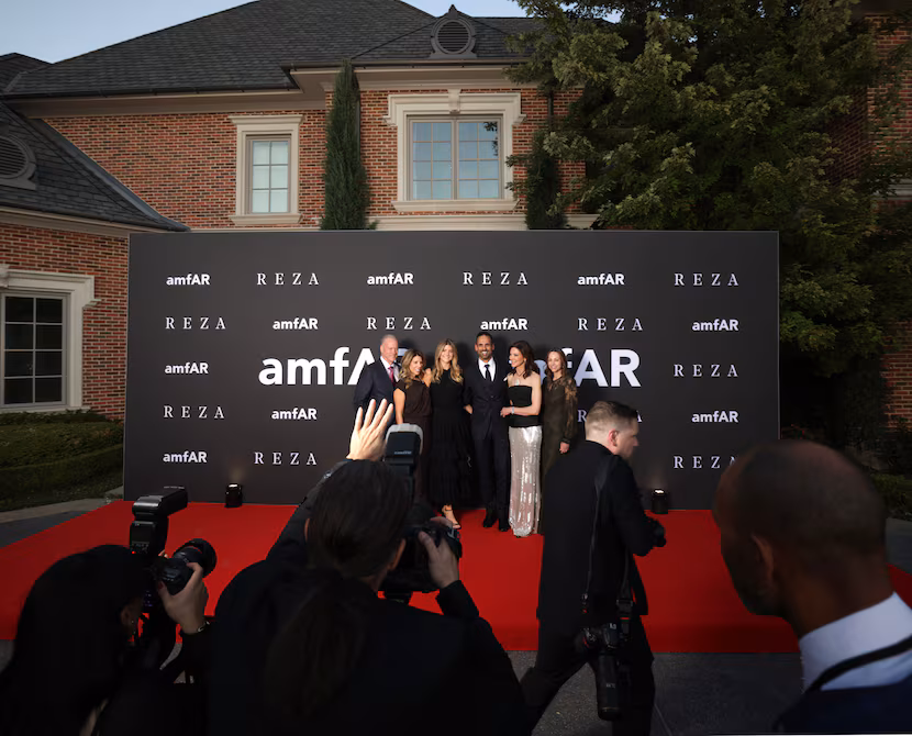 Charlotte Jones (second from right) navigates the red carpet along with members of her...