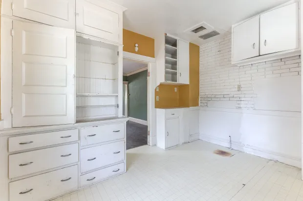 The kitchen’s built-in storage wall at 894 South Pasadena Avenue....