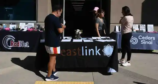 Breast cancer patients and survivors get information at the “Dance...