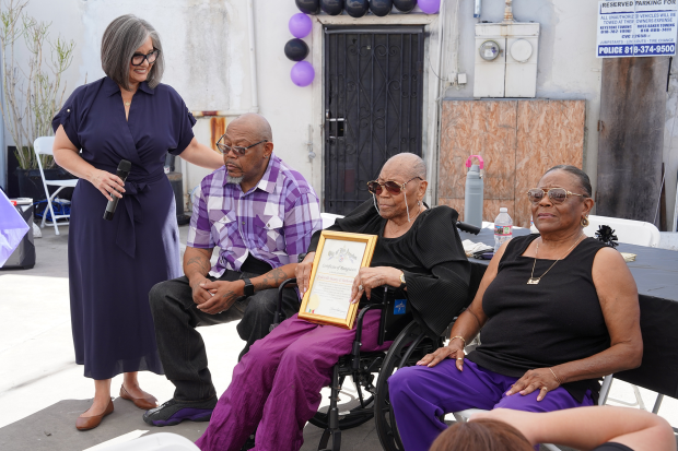 From left, Councilmember Monica Rodriguez, Gregory Faucett, Ollie Carter and...