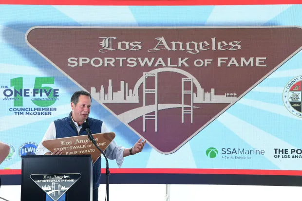 Inductee Philip D’Amato speaks at the annual Los Angeles Sportswalk...