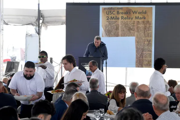 Petros Papadakis greets Dr. John Link, winner of the John...