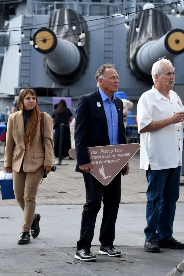 Mike Pentecost holds his plaque at the annual Los Angeles...
