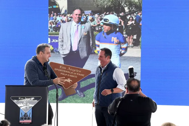 Petros Papadakis greets inductee Philip D’Amato at the annual Los...