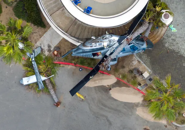 A 1980 Bell 222 helicopter lies where it crashed on...