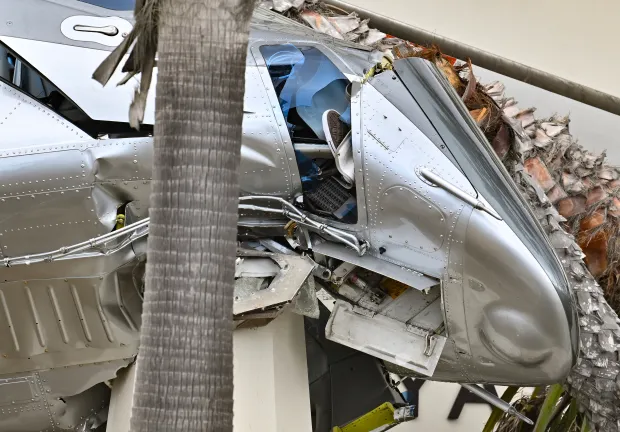 A shoe is stuck in the window of a 1980...