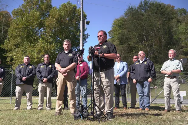 Humphreys County Sheriff Chris Davis, right, stands beside Hickman County Sheriff J. Craft as they respond to questions from reporters at a news conference Monday, Oct. 13, 2025, in McEwen, Tenn., at Accurate Energetic Systems. (AP Photo/Obed Lamy)