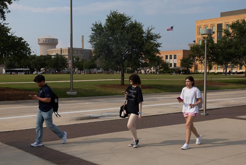 Students walk past Simpson Drill Field at Texas A&M University, Thursday, Sept. 18, 2025, in College Station. (Antranik Tavitian for The Texas Tribune)