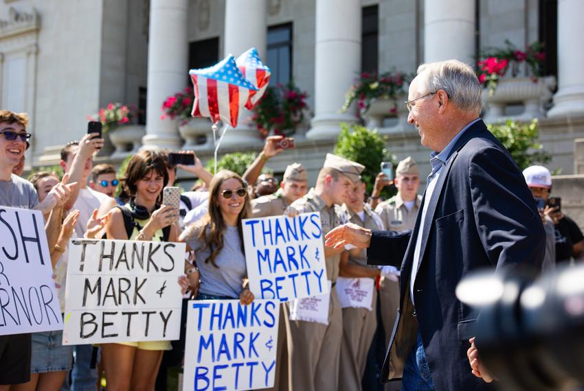 President Mark A. Welsh III and his wife Betty are greeted by A&M faculty and students as he leaves campus after resigning on Friday, Sept. 19, 2025.