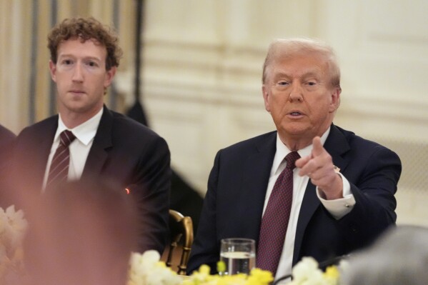 Facebook CEO Mark Zuckerberg listens as President Donald Trump speaks during a dinner in the State Dining Room of the White House, Thursday, Sept. 4, 2025, in Washington. (AP Photo/Alex Brandon)