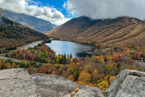 The view from Artists Bluff, a popular destination for fall foliage in Franconia Notch State Park in Franconia, N.H., Wednesday, Oct. 8, 2025. (AP Photo/Holly Ramer)