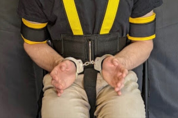 This photo provided by Safe Restraints Inc., in October 2025, shows a custom version of the WRAP restraining equipment made for the U.S. Immigration and Customs Enforcement agency. (Safe Restraints via AP)