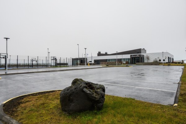Grunnskoli Grindavikur, a school, sits empty and closed in Grindavik, Iceland, Oct. 13, 2025. (AP Photo/Marco di Marco)