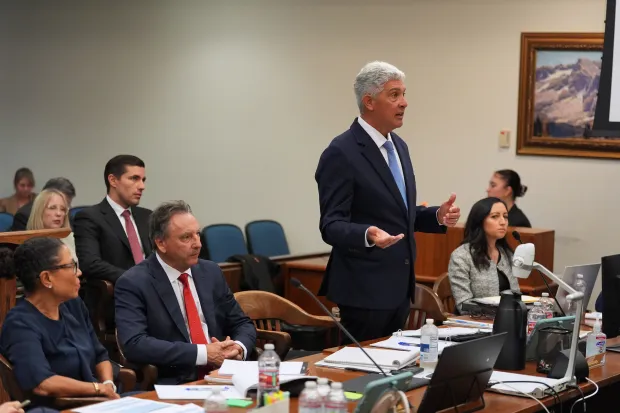 Attorney Todd Theodora gestures before opening statements in the trial...