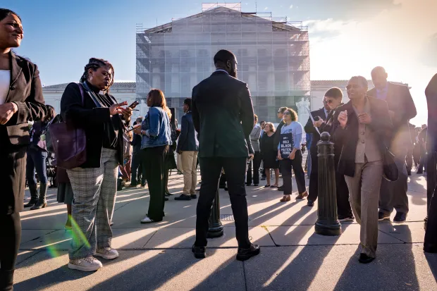 Voting rights activists gather outside the Supreme Court in Washington,...