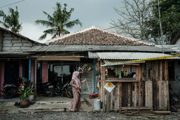 TOPSHOT – A warning sticker labelled “Danger Radiation” with a...