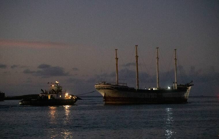 GEORGE F. LEE / GLEE@STARADVERTISER.COM
                                The four-masted full-rigged Falls of Clyde departed Honolulu Harbor for the last time today. The former U.S. National Historic Monument was destined to be sunk in the waters off Oahu after decades of controversy over her fate.