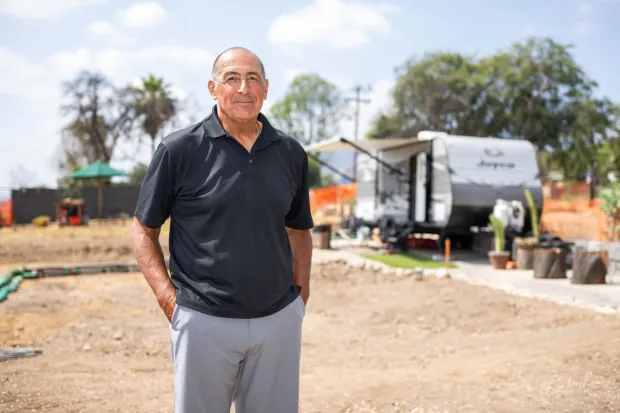 Marc Archuleta, 65, is living on his property with his wife in a trailer to save money to rebuild their Altadena home they lost in the Eaton fire on Thursday, Sept. 11, 2025. Archuleta has plans to rebuild using a plan from The Foothill Catalog. (Photo by Sarah Reingewirtz, Los Angeles Daily News/SCNG)
