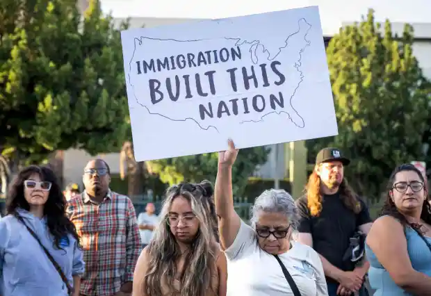 Yolanda Acevedo, of Pasadena, holds a protest sign during a rally at the Pasadena Auto Wash on Thursday, Aug. 28, 2025 where her nephew Jesus was detained along with five other employees in an immigration raid. (Photo by Sarah Reingewirtz, Los Angeles Daily News/SCNG)