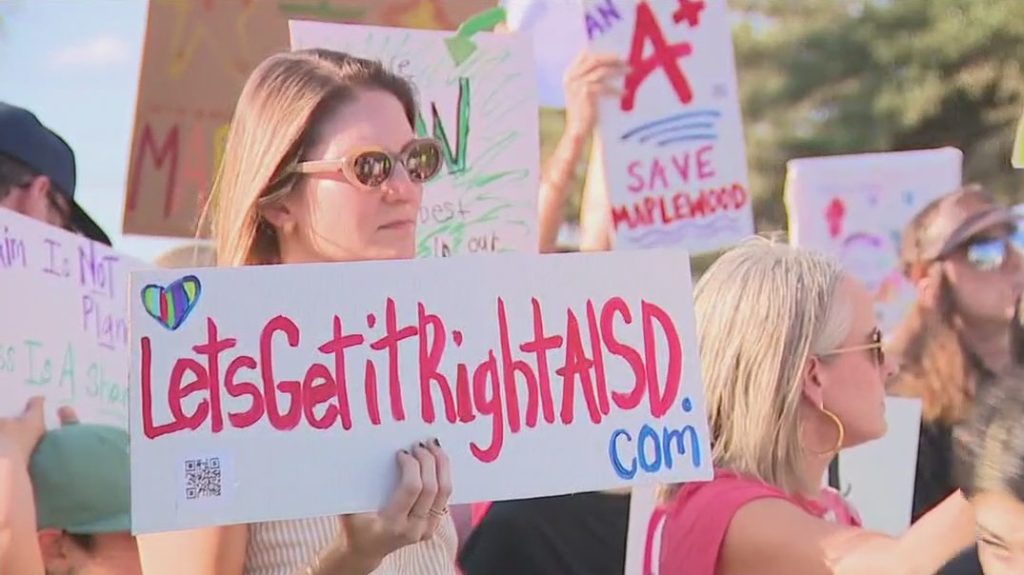 Concerned-community-members-protest-proposed-Austin-ISD-school-closures.jpg