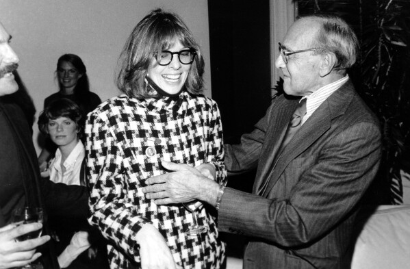 FILE - Acting teacher Sanford Meisner, right, greets his former student Diane Keaton at a party held in his honor by his students at the Neighborhood Playhouse School in New York City, Tuesday evening, Oct. 8, 1980. (AP Photo, File)