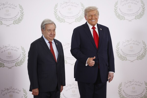 President Donald Trump and United Nations Secretary-General Antonio Guterres pose during the greeting ceremony before the family picture at the Gaza International Peace Summit, in Sharm el-Sheikh, Egypt, Monday, Oct.13 2025. (Yoan Valat, Pool photo via AP)