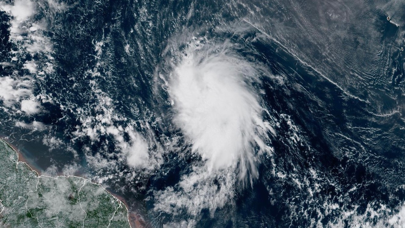This satellite image provided by the National Oceanic and Atmospheric Administration (NOAA) shows Tropical Storm Jerry in the Atlantic Ocean, Tuesday, Oct. 7, 2025.
